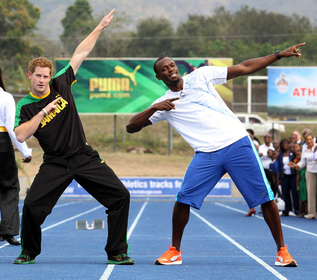 El PrÃncipe Harry junto a Usain Bolt.